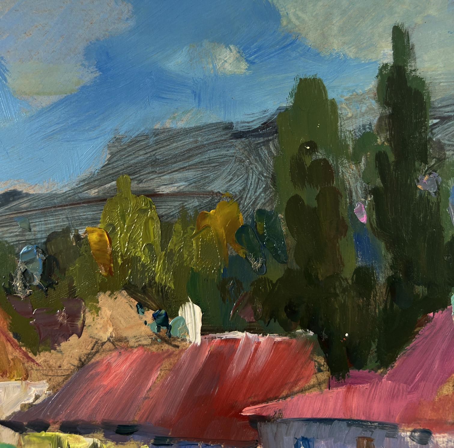 Oil painting of vibrant red roofed village among mountains by Yuriy Suprunchuk
