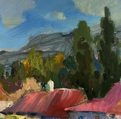 Oil painting of vibrant red roofed village among mountains by Yuriy Suprunchuk