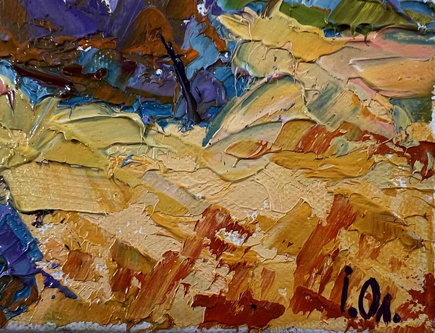 Vibrant oil painting Haystacks in a field by Oleksiy Ivanyuk with bold textured strokes