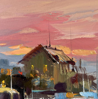 Rustic wooden house by Yuriy Suprunchuk at pink orange sunset