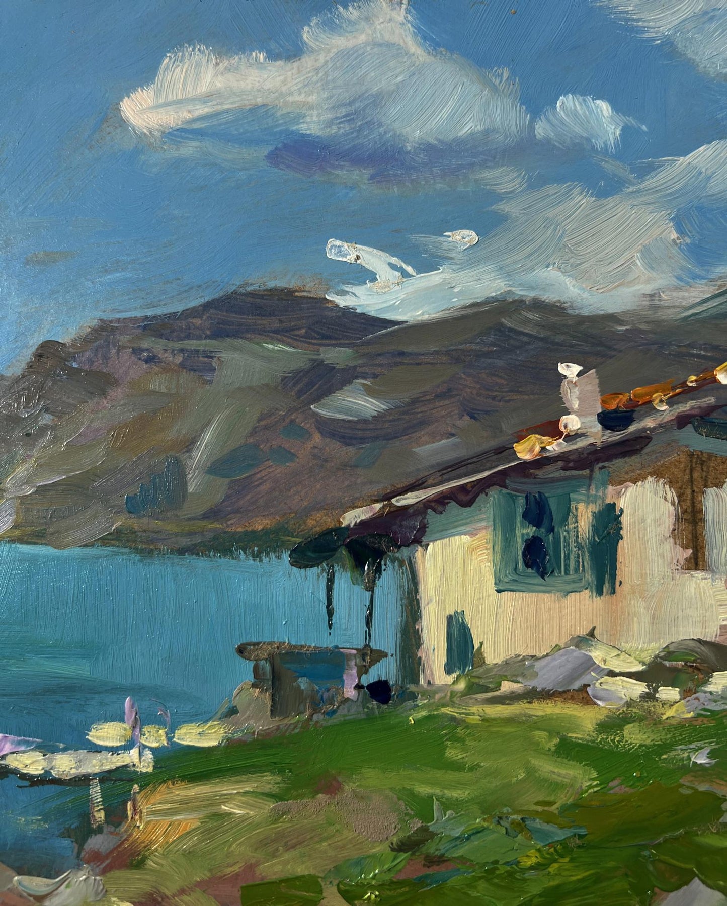 Oil painting of rustic house by lake with teal shutters by Yuriy Suprunchuk
