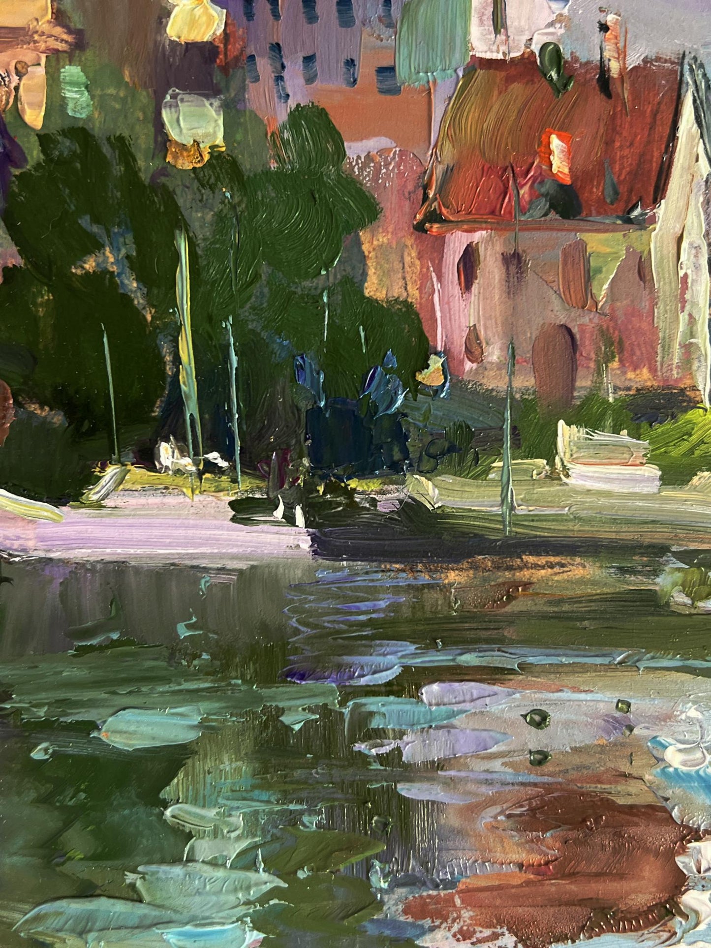 Vibrant impressionist oil painting of riverside houses by Yuriy Suprunchuk