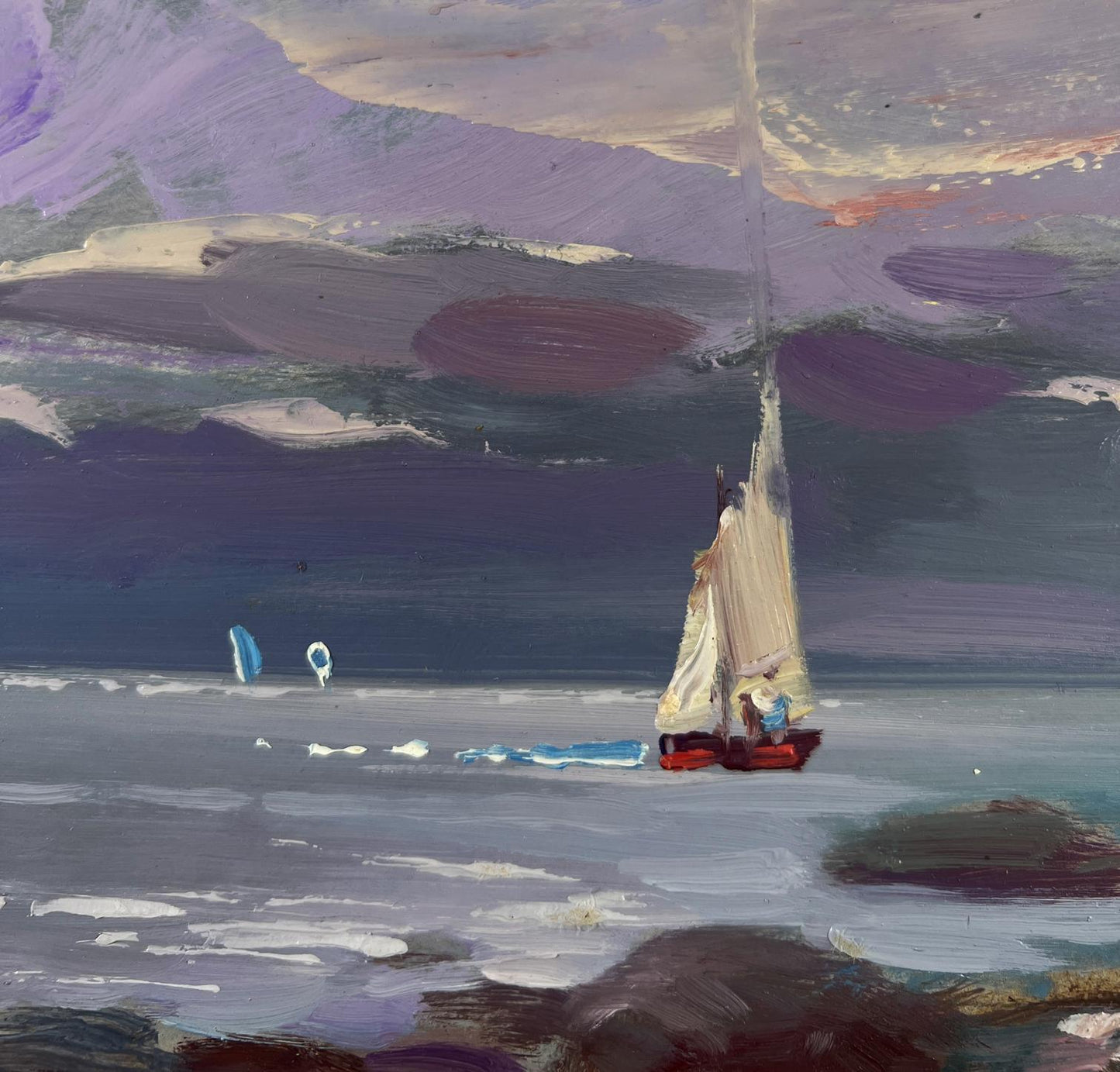 Oil painting of red sailboat with cream sail on blue waves by Yuriy Suprunchuk