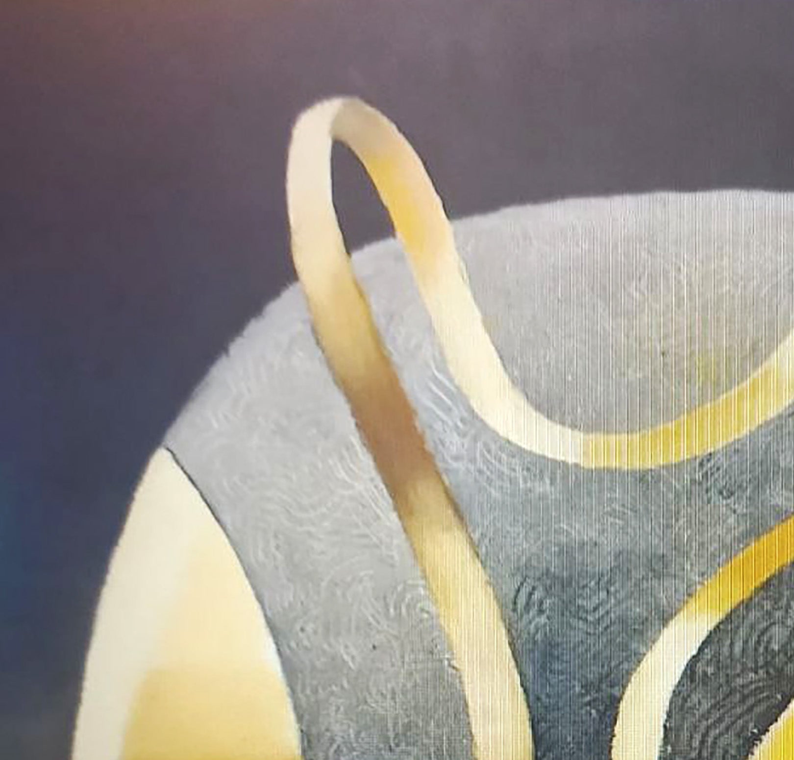 Sleek gold curved handle on textured gray shoulder of Alexander Strashevich oil painting form with ribbon