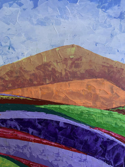 Oil painting In the mountains by V. Zadorozhnya: textured hills in browns and oranges under blue sky