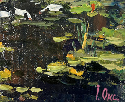 Impasto oil painting of white swans on dark lake with lily pads by Oksana Ivanyuk