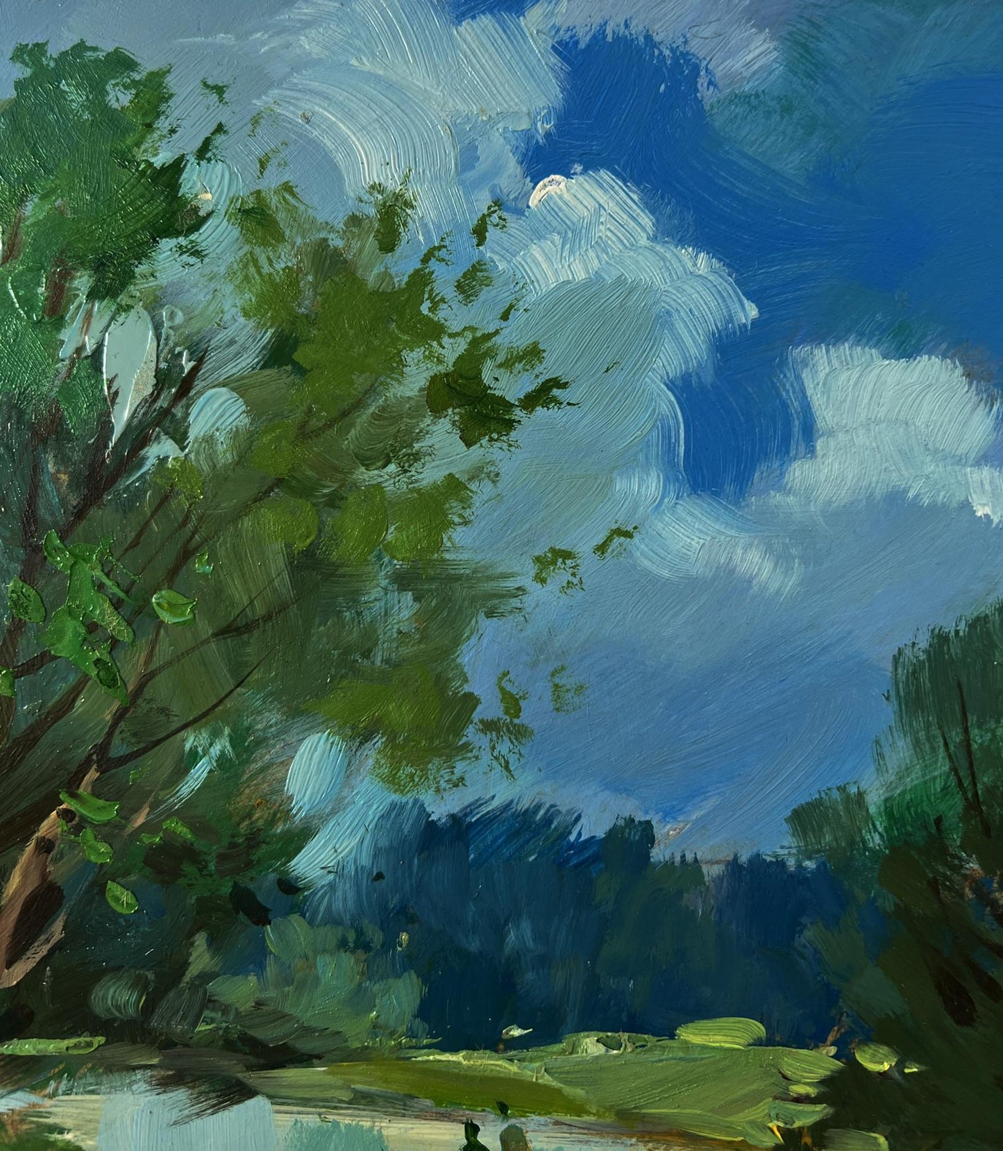 Vibrant impressionist oil painting of lush green trees, blue sky, bridge over river by Yuriy Suprunchuk