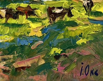 Vibrant impressionist oil painting by Oksana Ivanyuk of cows grazing outside village