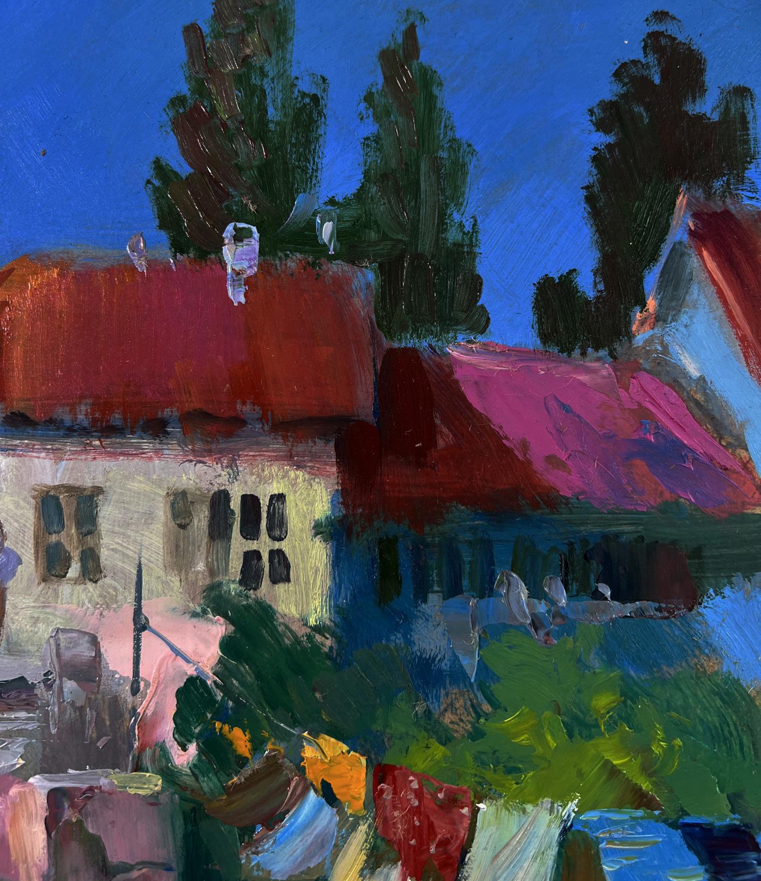 Vibrant impressionist oil painting by Yuriy Suprunchuk of houses with red pink roofs