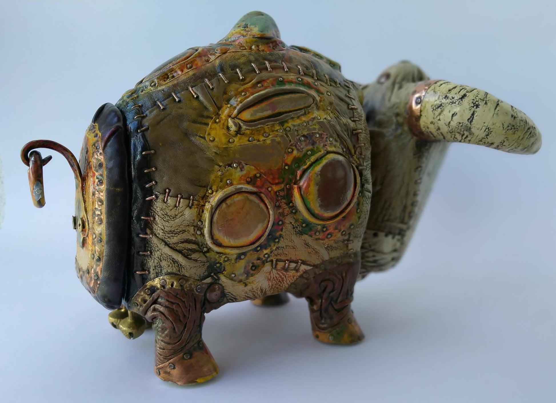 Steampunk ceramic pig figurine by Dmytro Kravtsov with brass accents