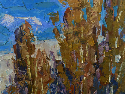 Oil painting At the Obelisk by Oksana Ivanyuk: rugged canyon under blue sky