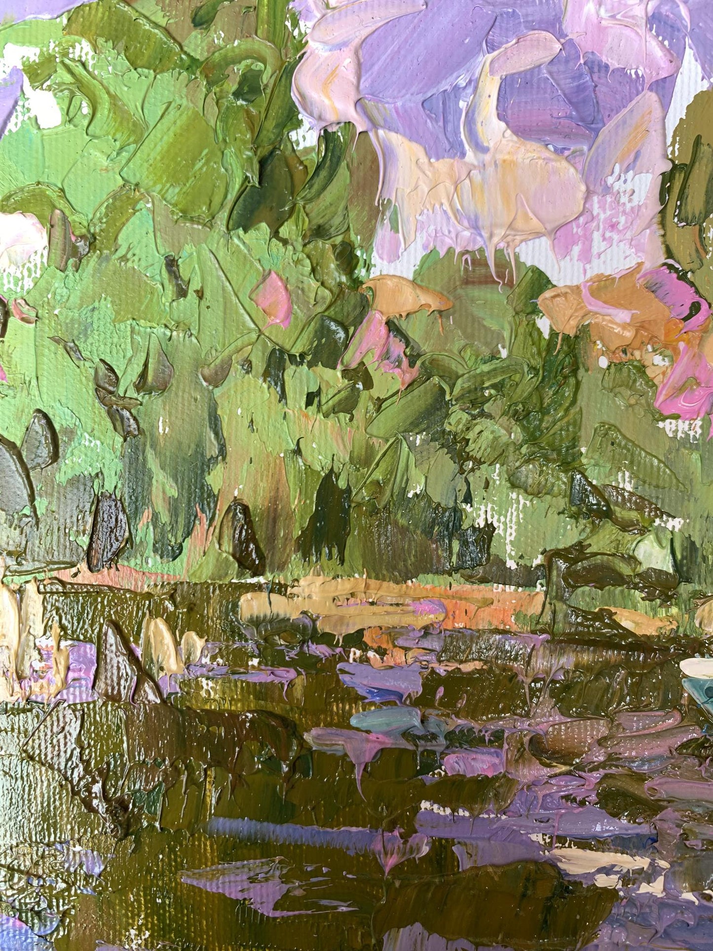 A vibrant impressionist painting featuring lush green foliage and purple blossoms reflected in a textured, dark water surface.