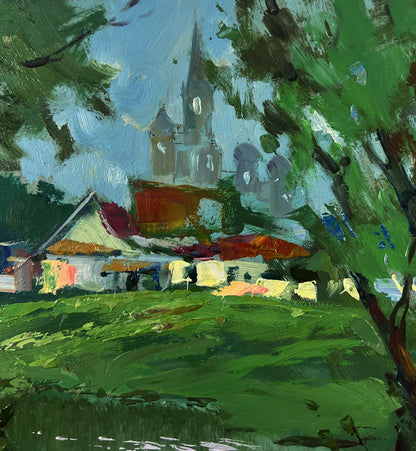 Impressionistic oil painting by Yuriy Suprunchuk of village with river, boats, church spire