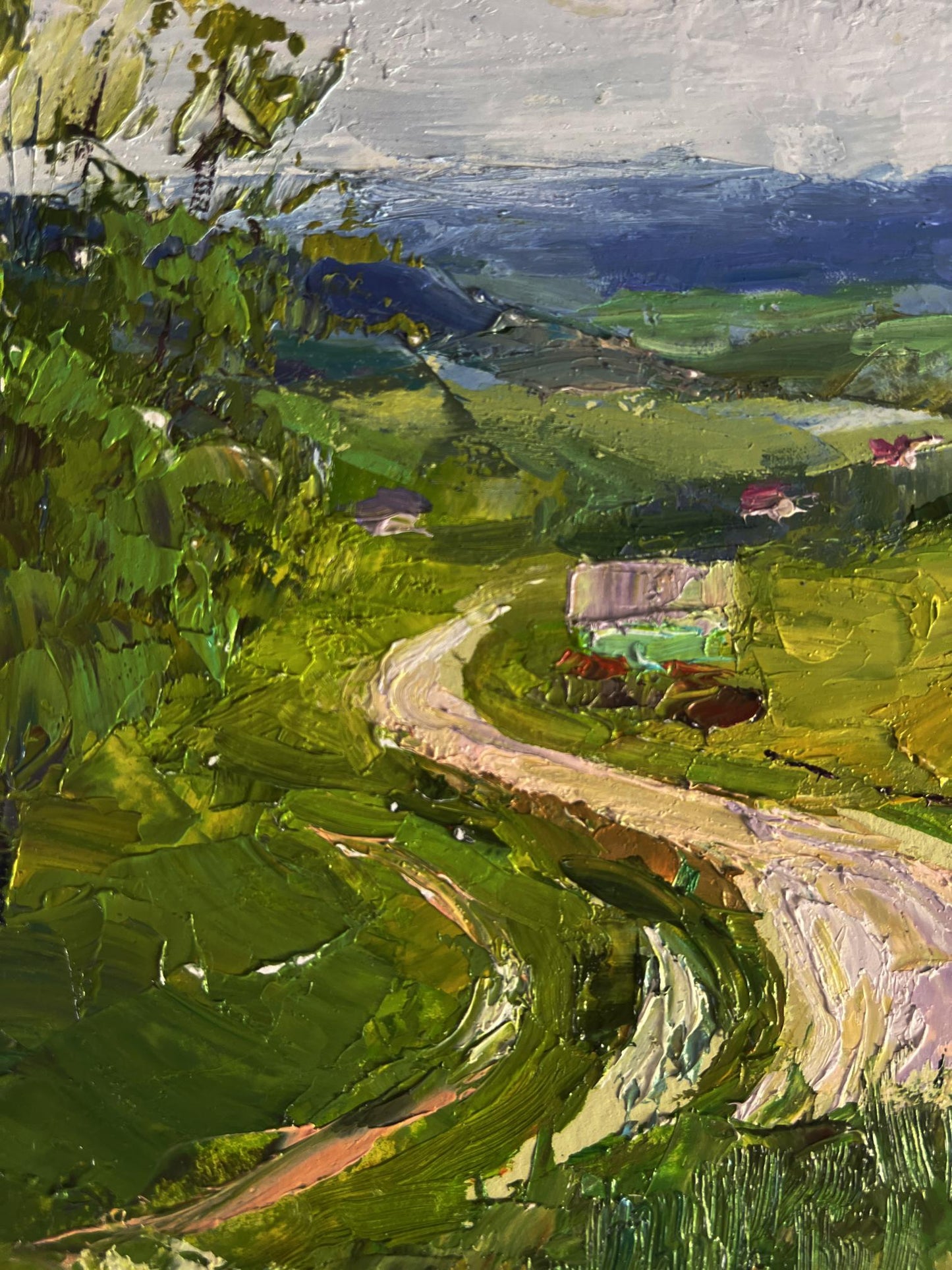 Vibrant impressionist oil painting by Boris Serdyuk: wavy mountain road through lush fields