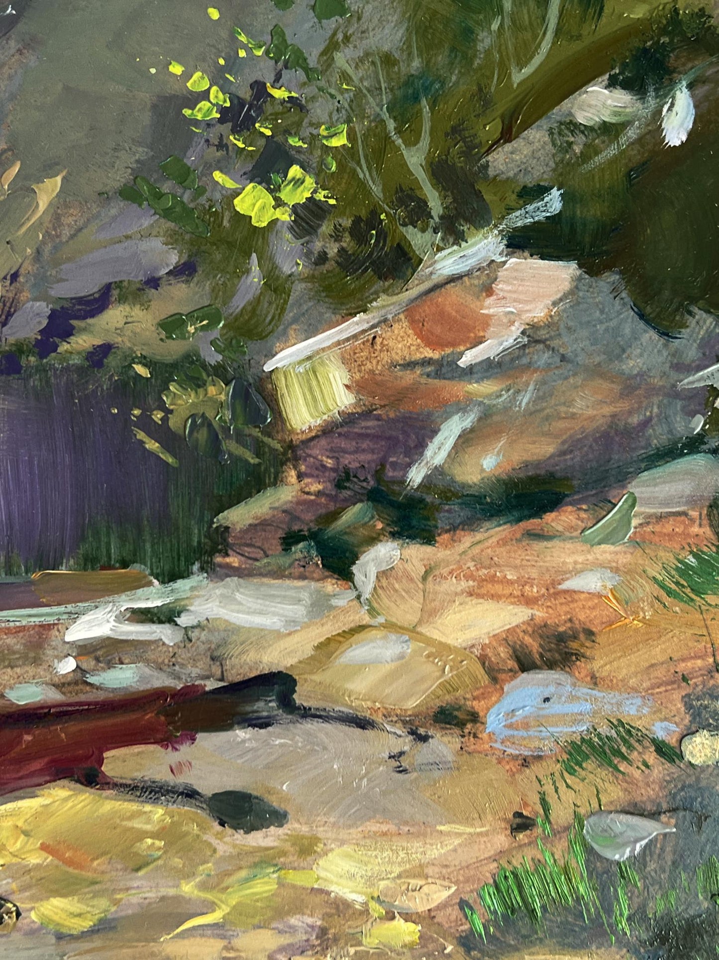 Oil painting of boats on seashore by Yuriy Suprunchuk with rocky streambed