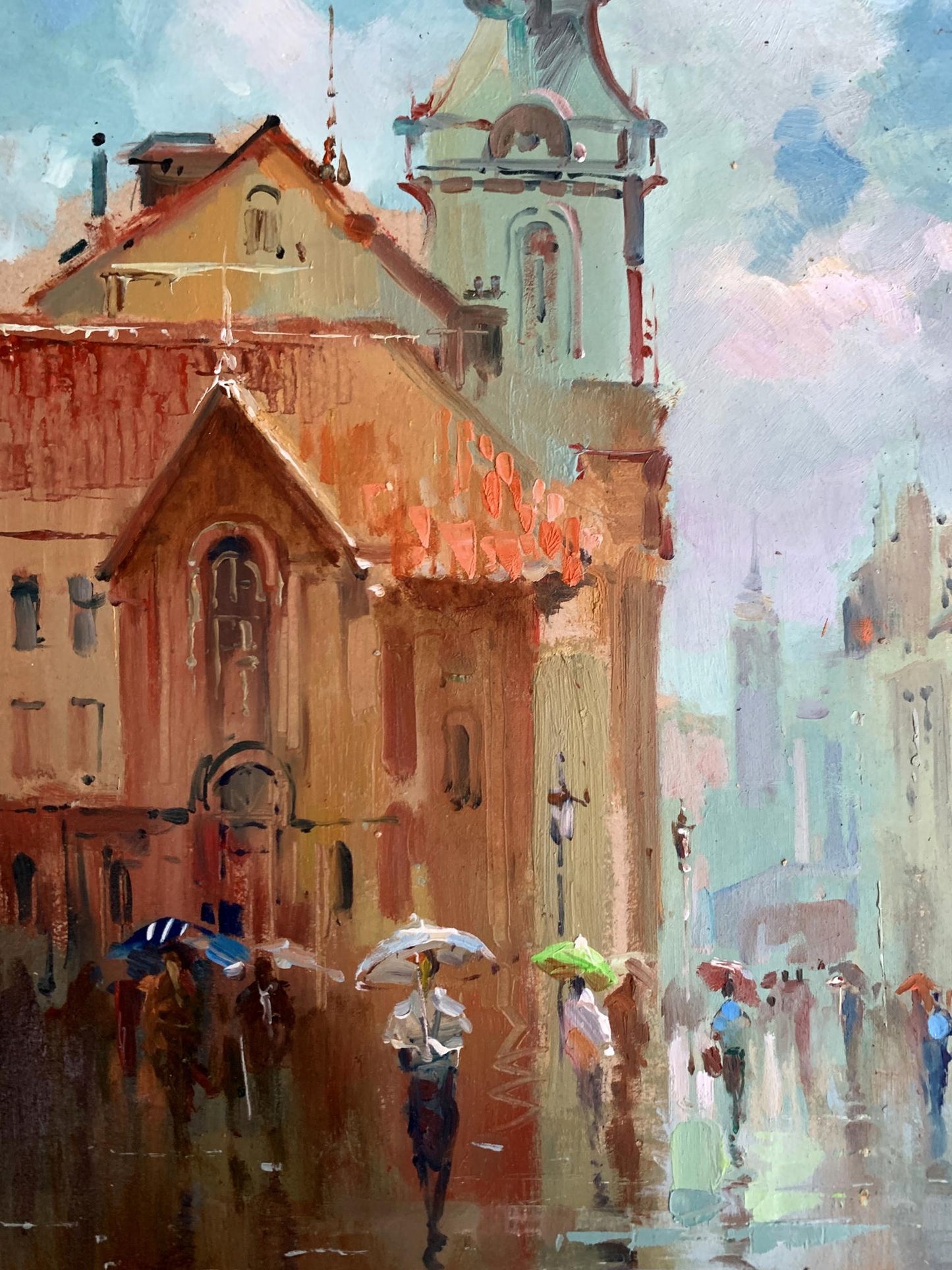 Vibrant impressionist oil painting by Yuriy Suprunchuk: rainy urban street with colorful umbrellas