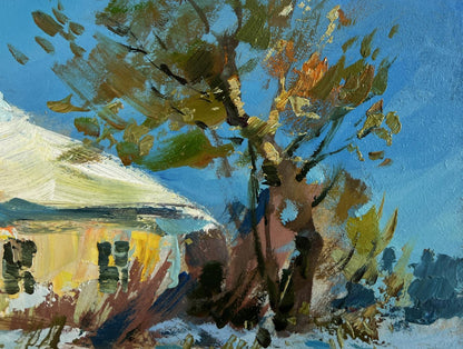 Oil painting of autumn tree by Yuriy Suprunchuk against blue sky