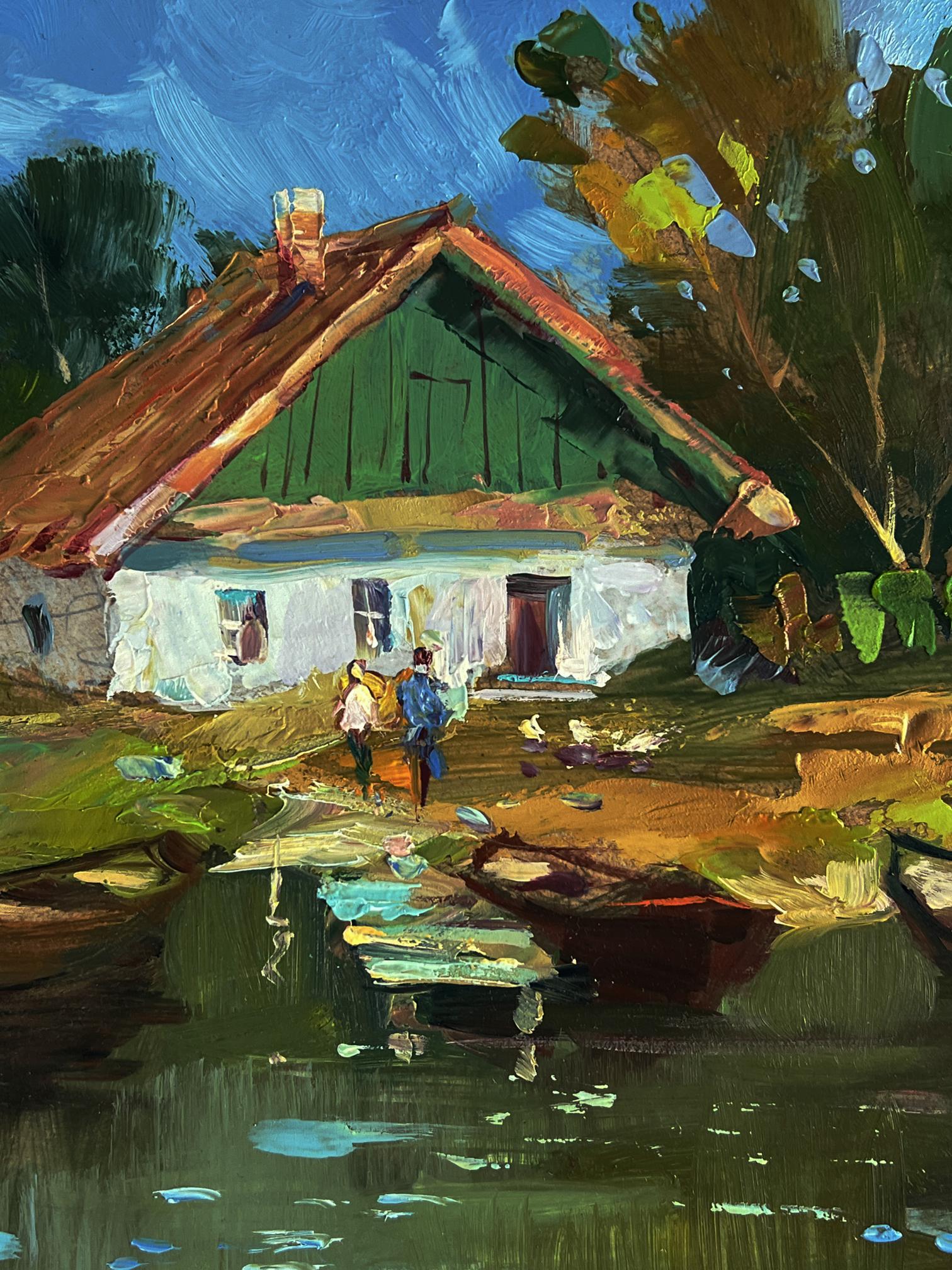 Oil painting of rustic cottage with boats by Yuriy Suprunchuk