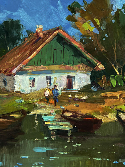 Oil painting of rustic cottage with boats by Yuriy Suprunchuk