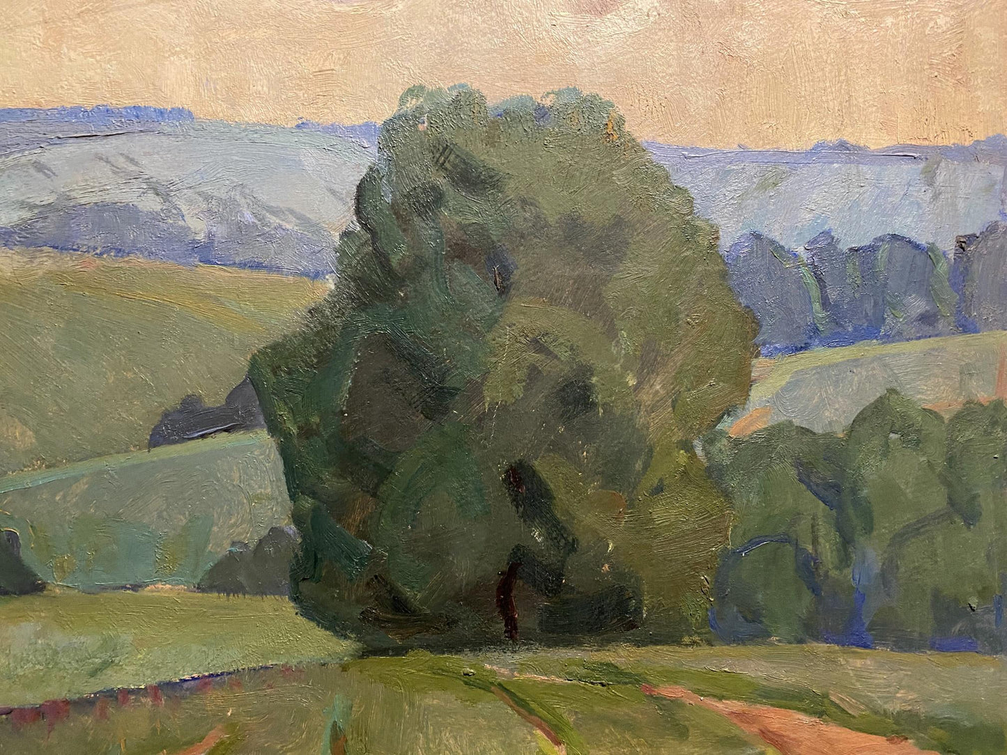 Oil painting of lush green tree in meadow by Nikolai Hrustalenko