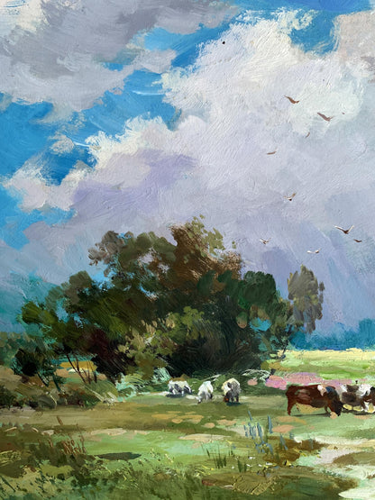 Vibrant impressionist oil painting by Yuriy Suprunchuk: pastoral fields, cows, cloudy sky