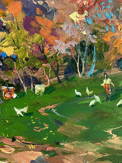 Vibrant impressionist oil painting by Yuriy Suprunchuk of figure in orange dress in lush field