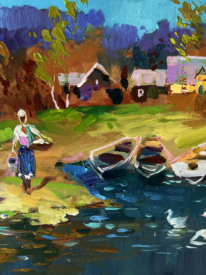 Vibrant impressionist oil painting by Yuriy Suprunchuk of woman on colorful shoreline with boats