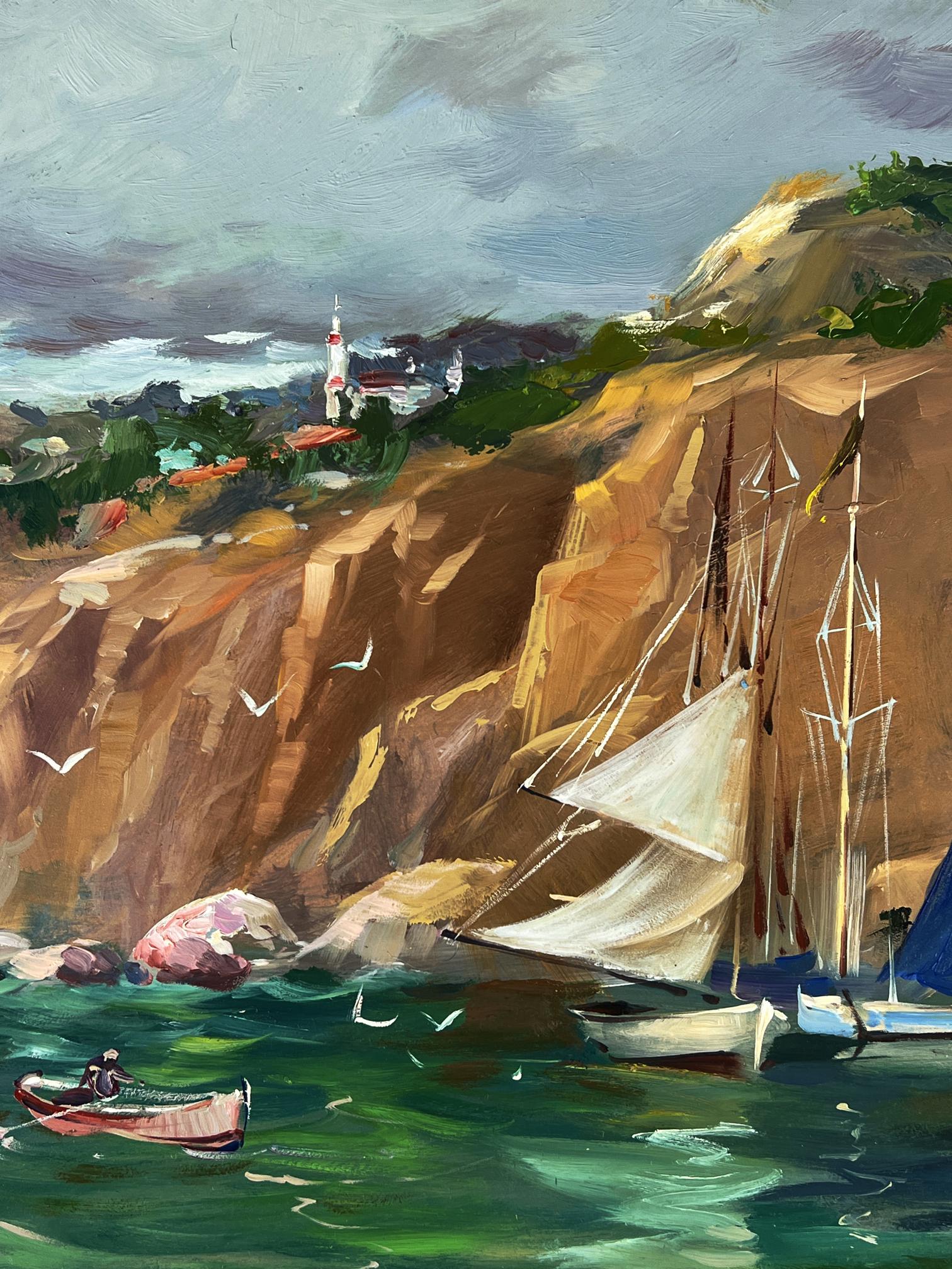 Oil painting Ships at the mountain by Yuriy Suprunchuk: sailboat by ochre cliffs