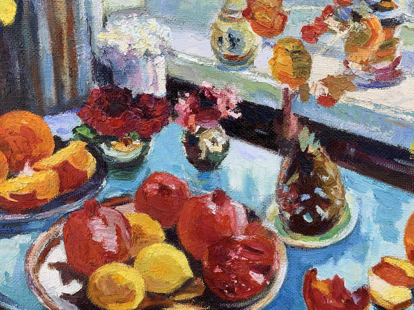 Oil painting The fruit table is set by Boris Serdyuk with pomegranates, lemons, flowers