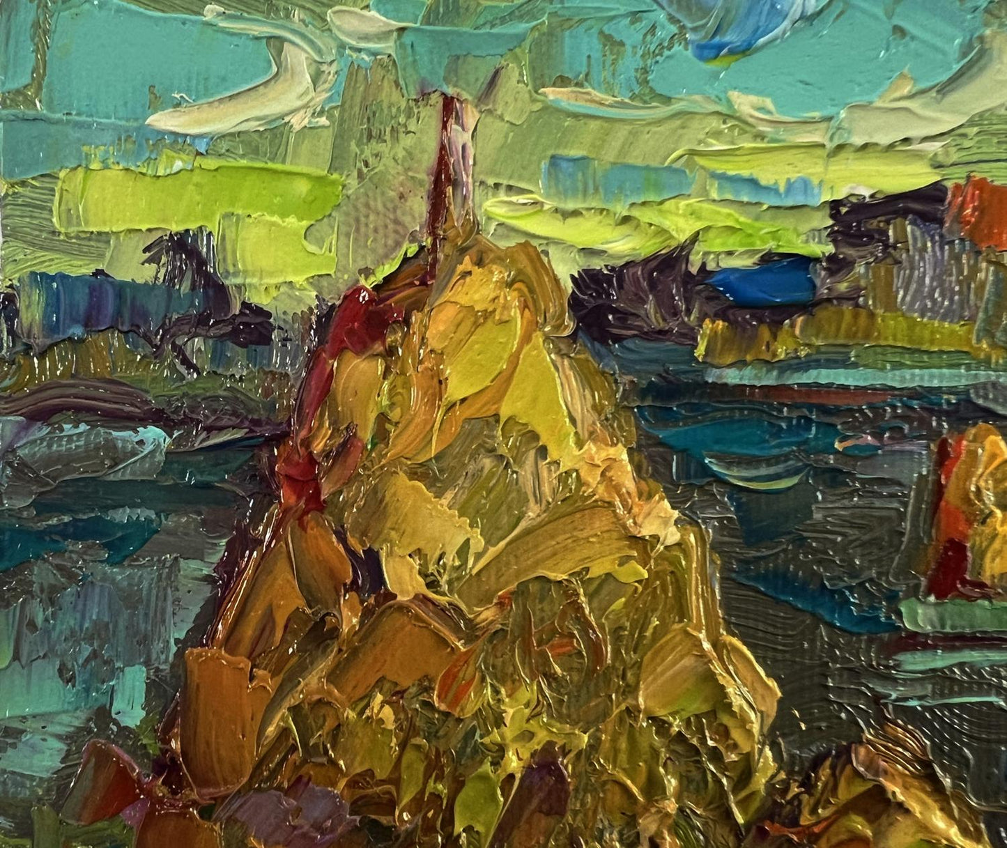 Oil painting by Oksana Ivanyuk: textured golden mountain peak in vibrant sky