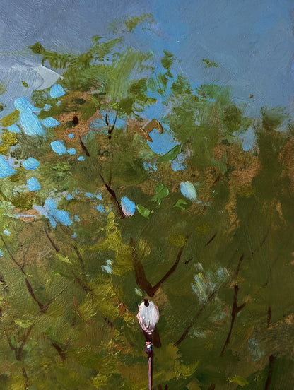 Impressionist oil painting of lone white figure under green blue foliage by Yuri Suprunchuk