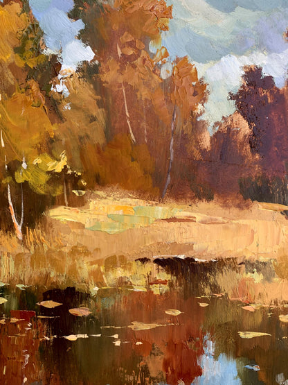 Oil painting by Yuriy Suprunchuk: golden autumn trees by reflective pond