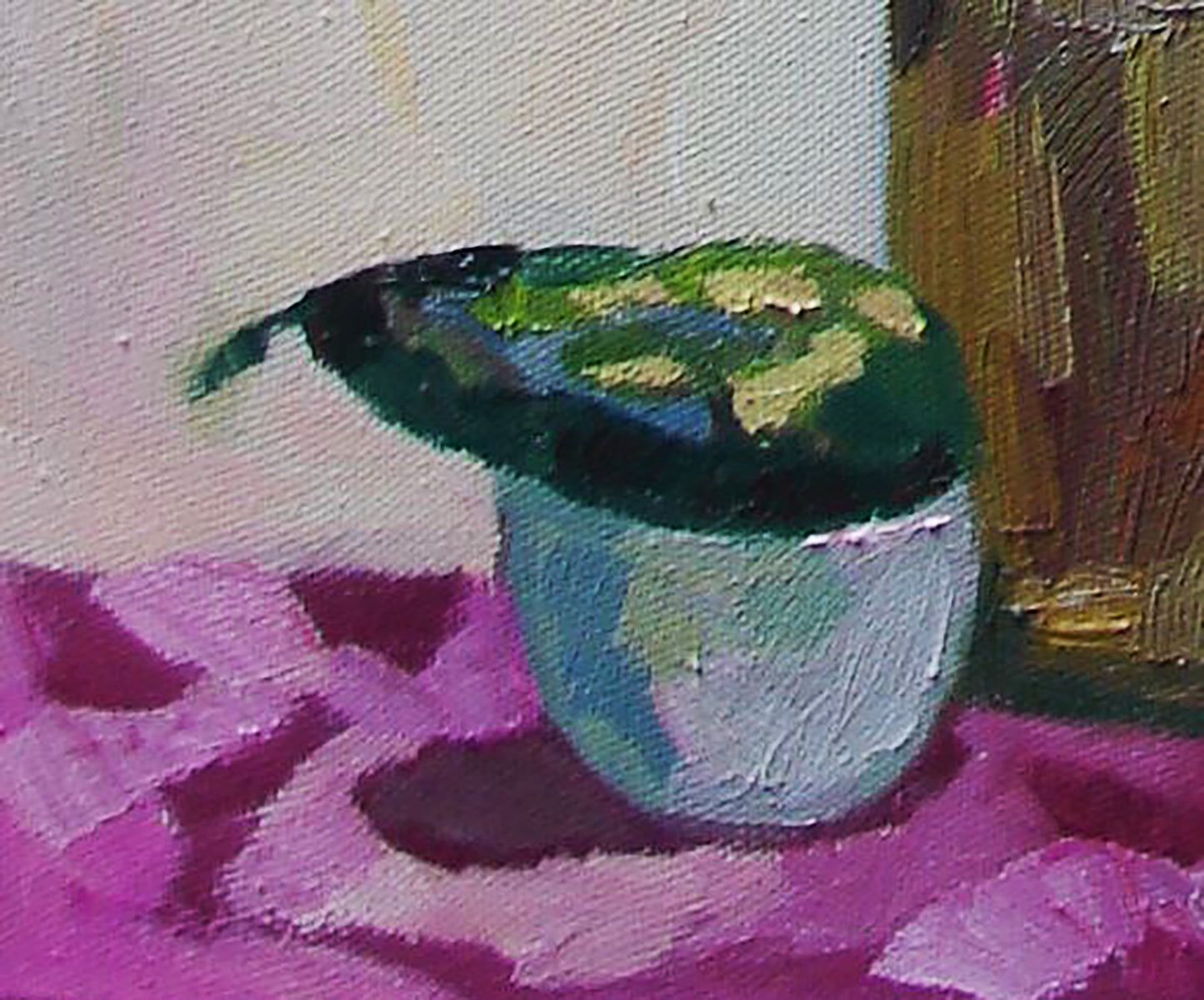 Glossy green blue ceramic bowl on pink surface by Tatyana Shulyak