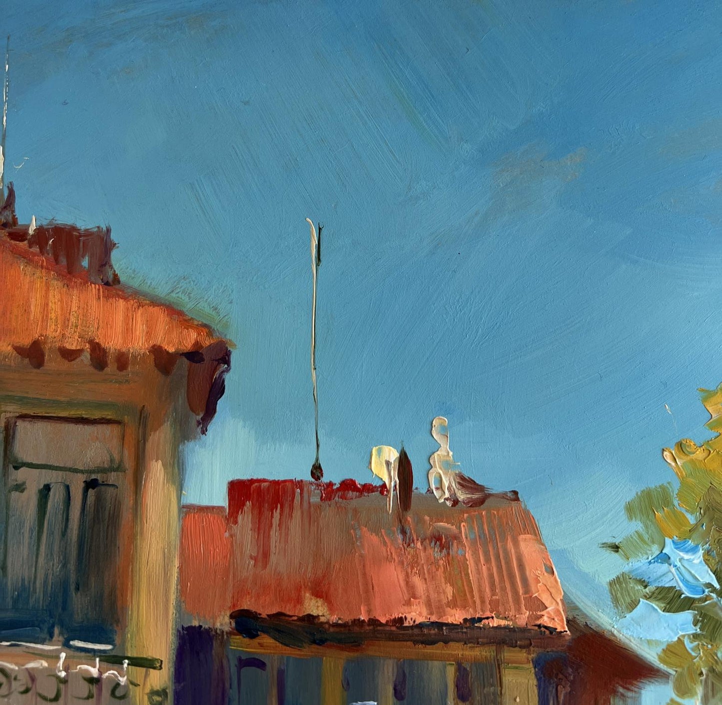 Oil painting Warm wind on the streets by Yuriy Suprunchuk: orange tiled roof with antenna
