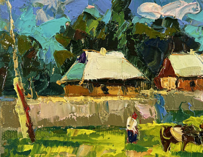 Vibrant impressionist oil painting by Oksana Ivanyuk: cows graze outside rustic village