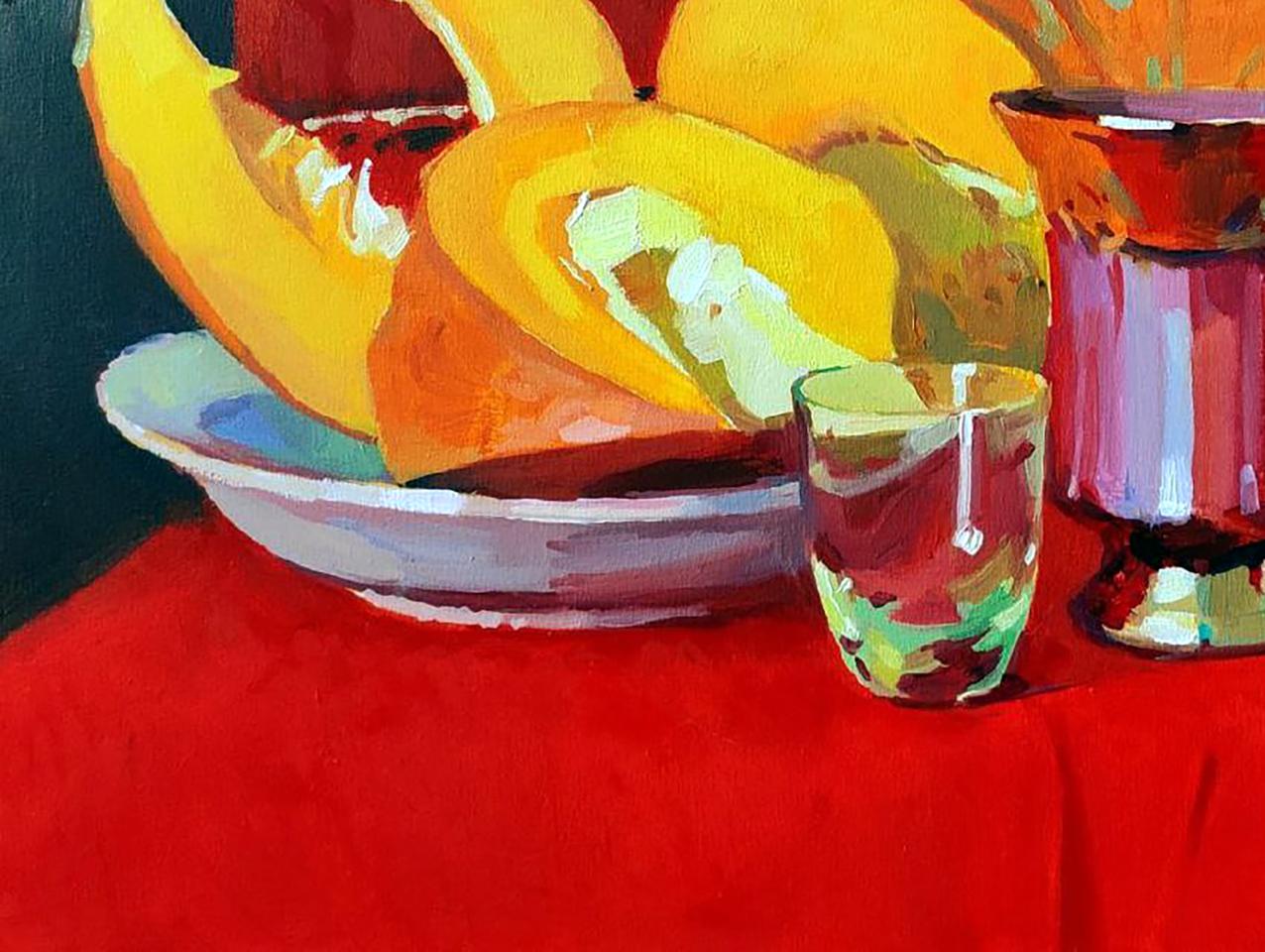Oil painting of vibrant yellow-orange pumpkin slice on plate by Anastasia Yaroshevich