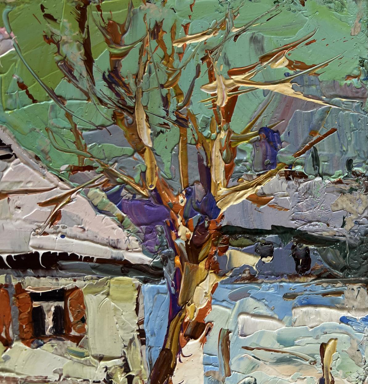 Oil painting of textured winter tree by Oksana Ivanyuk with white-roofed buildings