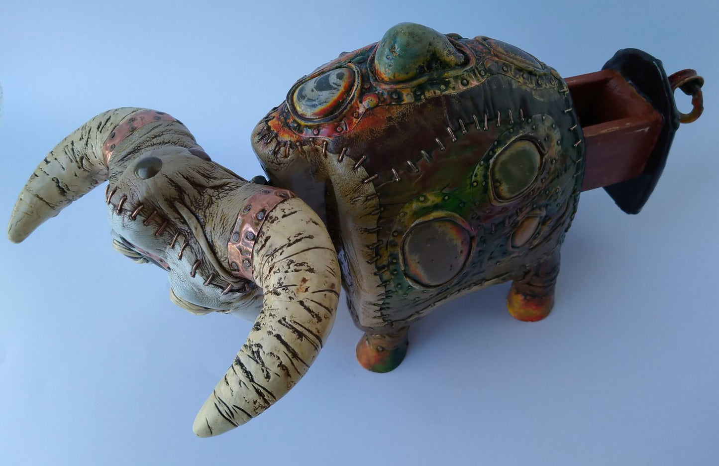 Handcrafted ceramic elephant art casket by Dmytro Kravtsov with patchwork design