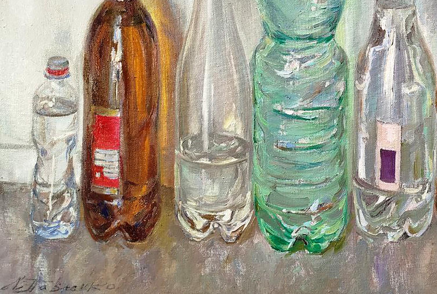 Translucent green ribbed plastic water bottle with white cap by Leonid Pavlenko
