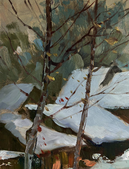 Oil painting of snow-covered rooftops and bare trees in winter evening by Yuriy Suprunchuk