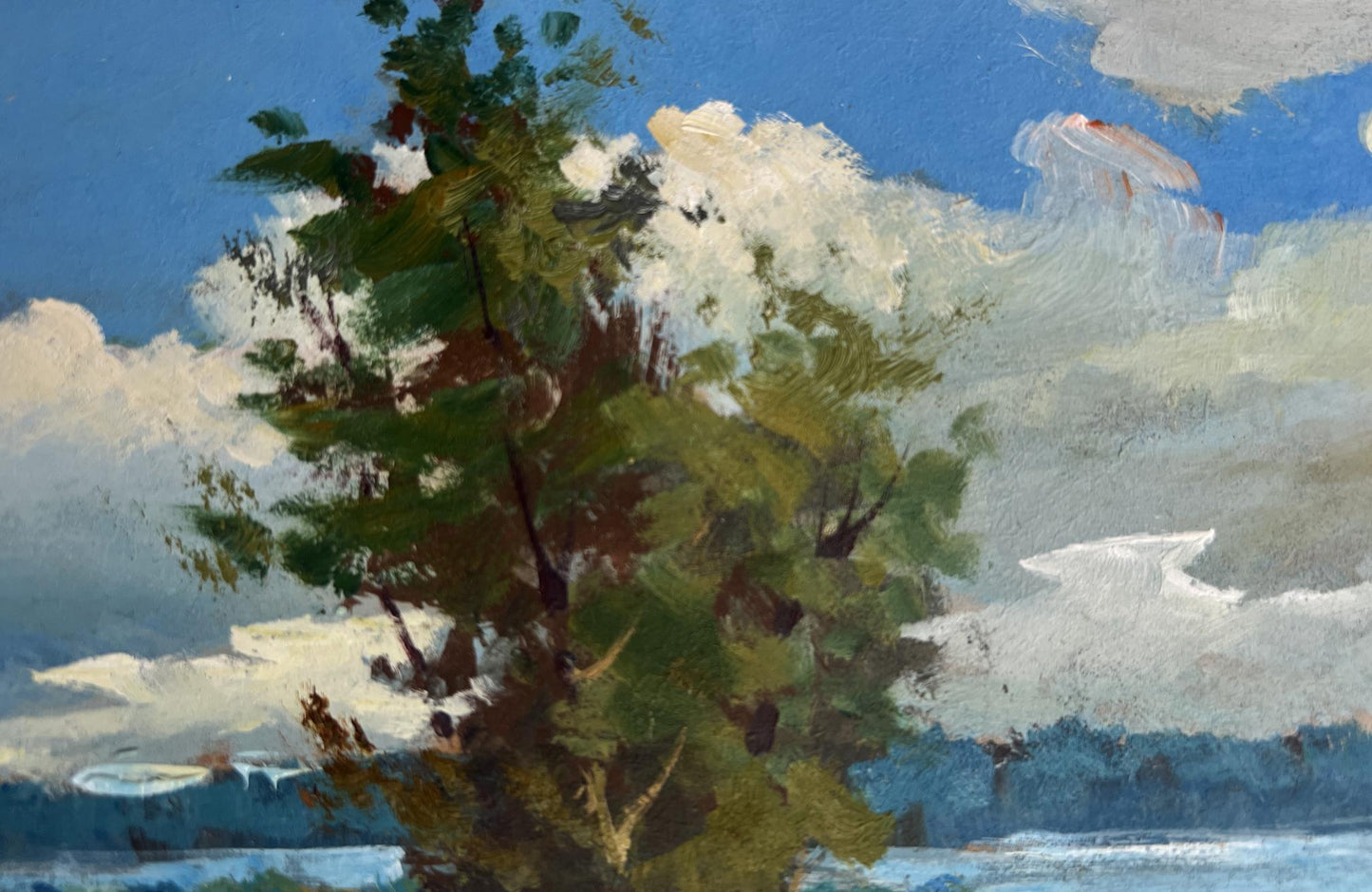 Oil painting by Yuriy Suprunchuk of lush green tree against blue sky