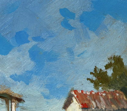 Oil painting by Yuriy Suprunchuk: blue sky over red roofs and bridge to city