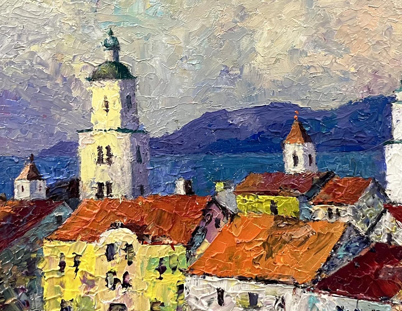 Vibrant impressionist oil painting by Serhiy Rybak overlooking main street town