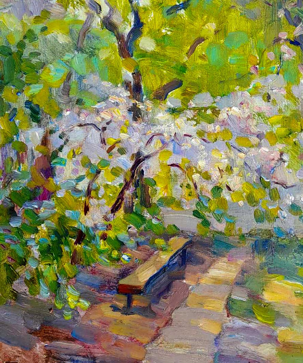 Painting of wooden bench with dark blue seat under blooming white trees by Ivan Kovalenko