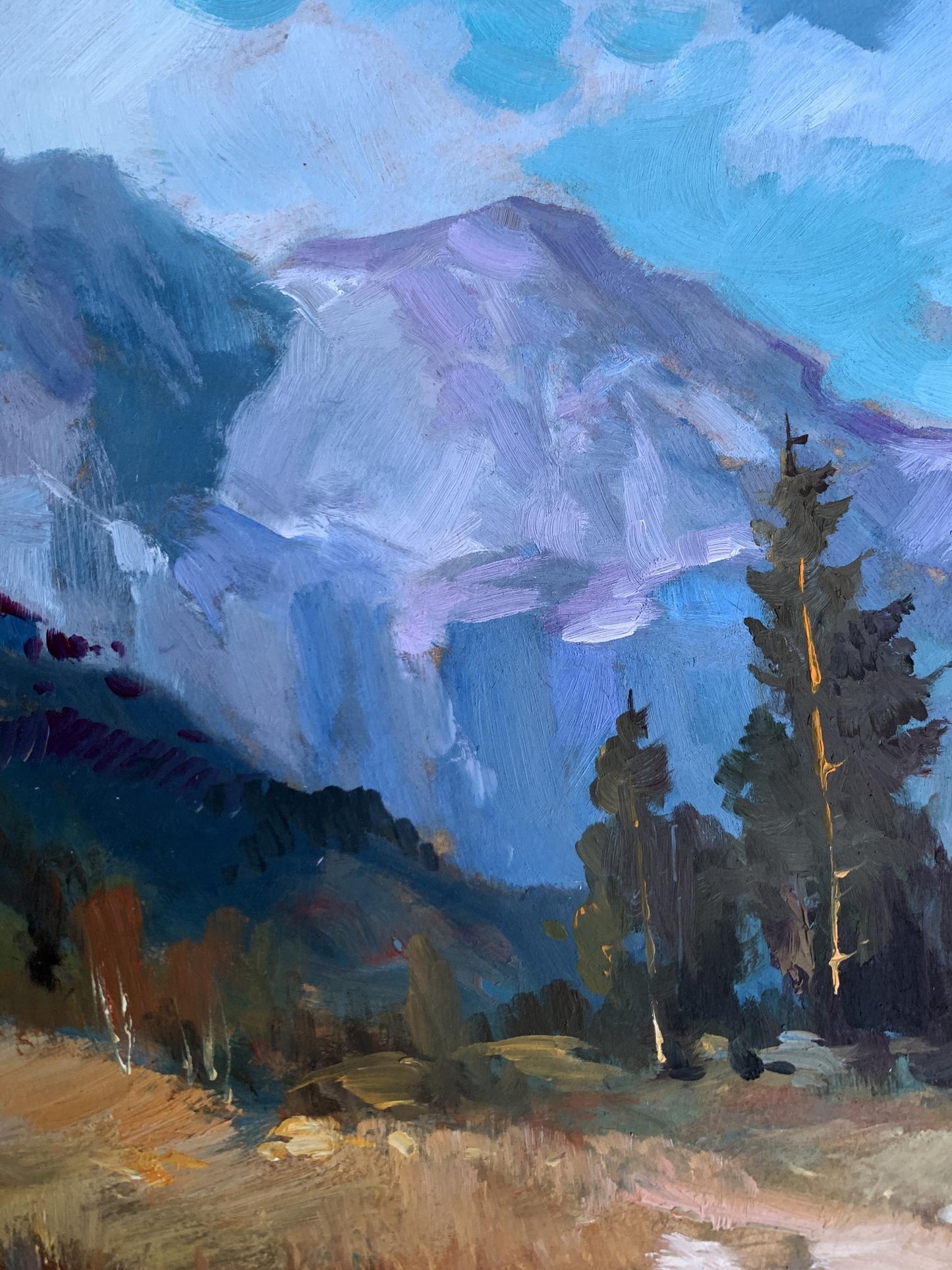 Vibrant oil painting of road to snow-capped mountains by Yuriy Suprunchuk