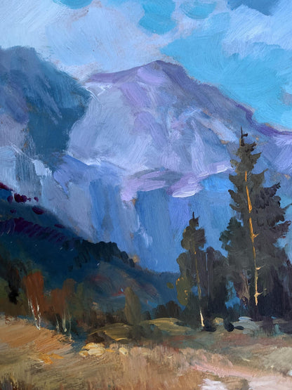 Vibrant oil painting of road to snow-capped mountains by Yuriy Suprunchuk