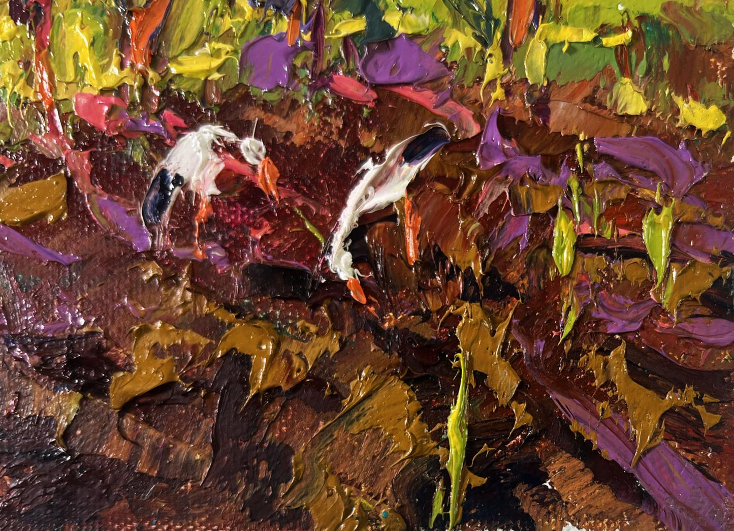 Vibrant impressionist oil painting of two white storks by Oksana Ivanyuk