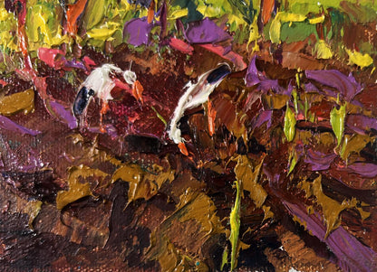 Vibrant impressionist oil painting of two white storks by Oksana Ivanyuk