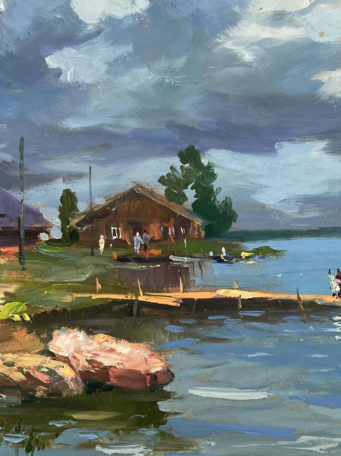 Oil painting of rustic house with thatched roof by river bank by Yuriy Suprunchuk