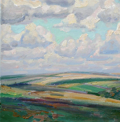 Oil painting In the fields by Leonid Pavlenko: green hills and clouds